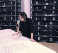 Analia Saban viewing the Sol LeWitt and Frederick Hammersley works she selected