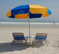 Beach Chairs and Umbrella, photograph by Paul Brennan (CC0)