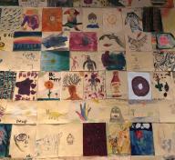 Community wall in the Boone Children’s Gallery. Artwork made by visitors.
