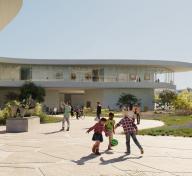 Rendering of gallery building and outdoor plaza with people, landscaping, and sculpture