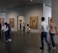 Rendering of visitors in a gallery with art on the walls and pedestals