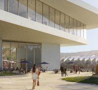 Rendering of exterior view of building with art and people outside