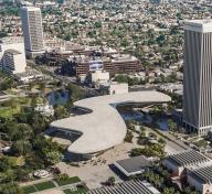 Aerial view of amorphous building in cityscape