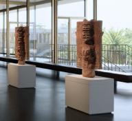 Rendering of interior view of gallery with art of the ancient Americas and visitors