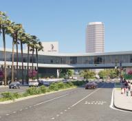 Rendering of gray museum building spanning over a boulevard, with pedestrians and landscaping