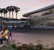 Rendering of concrete museum building at dusk, with visitors at a cafe in the foreground