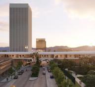 Exterior view of building bridging across a major thoroughfare