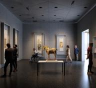 Gallery with visitors and artworks on view